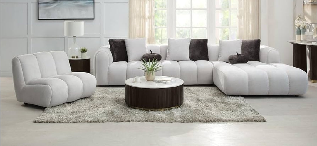 Channel tufted Right facing sectional upholstered in white fabric waccent pillows