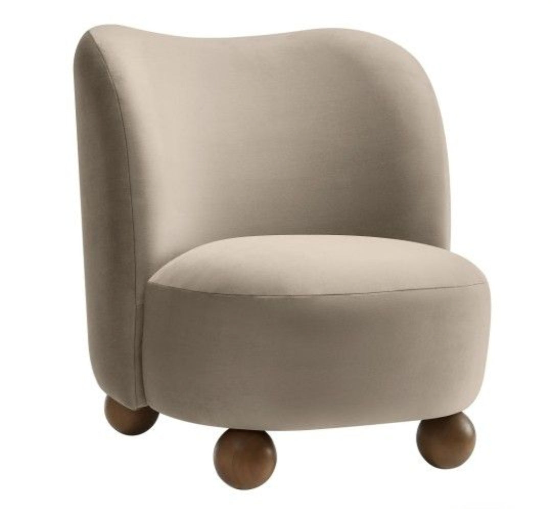 Accent lounge chair upholstered in Taupe Performance Velvet with Walnut legs