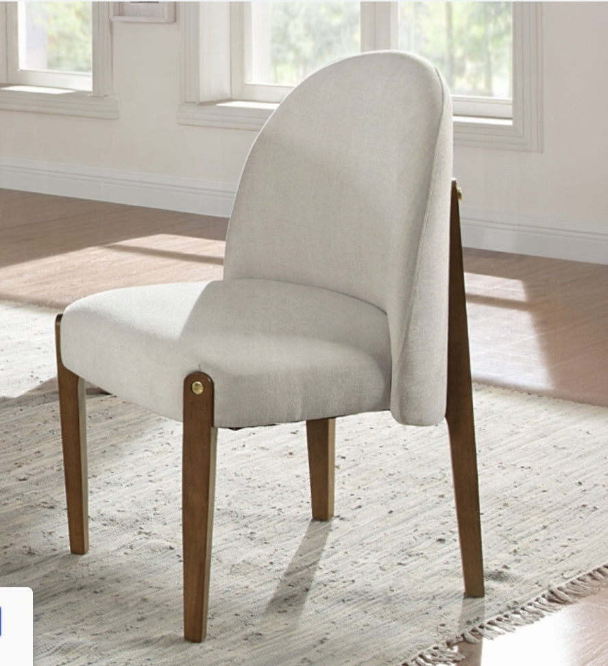 Liseth Upholstered Dining chair finished in walnut