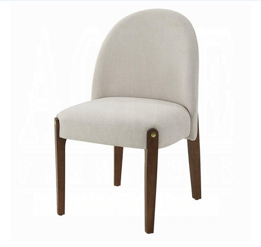 Liseth Upholstered Dining chair finished in walnut