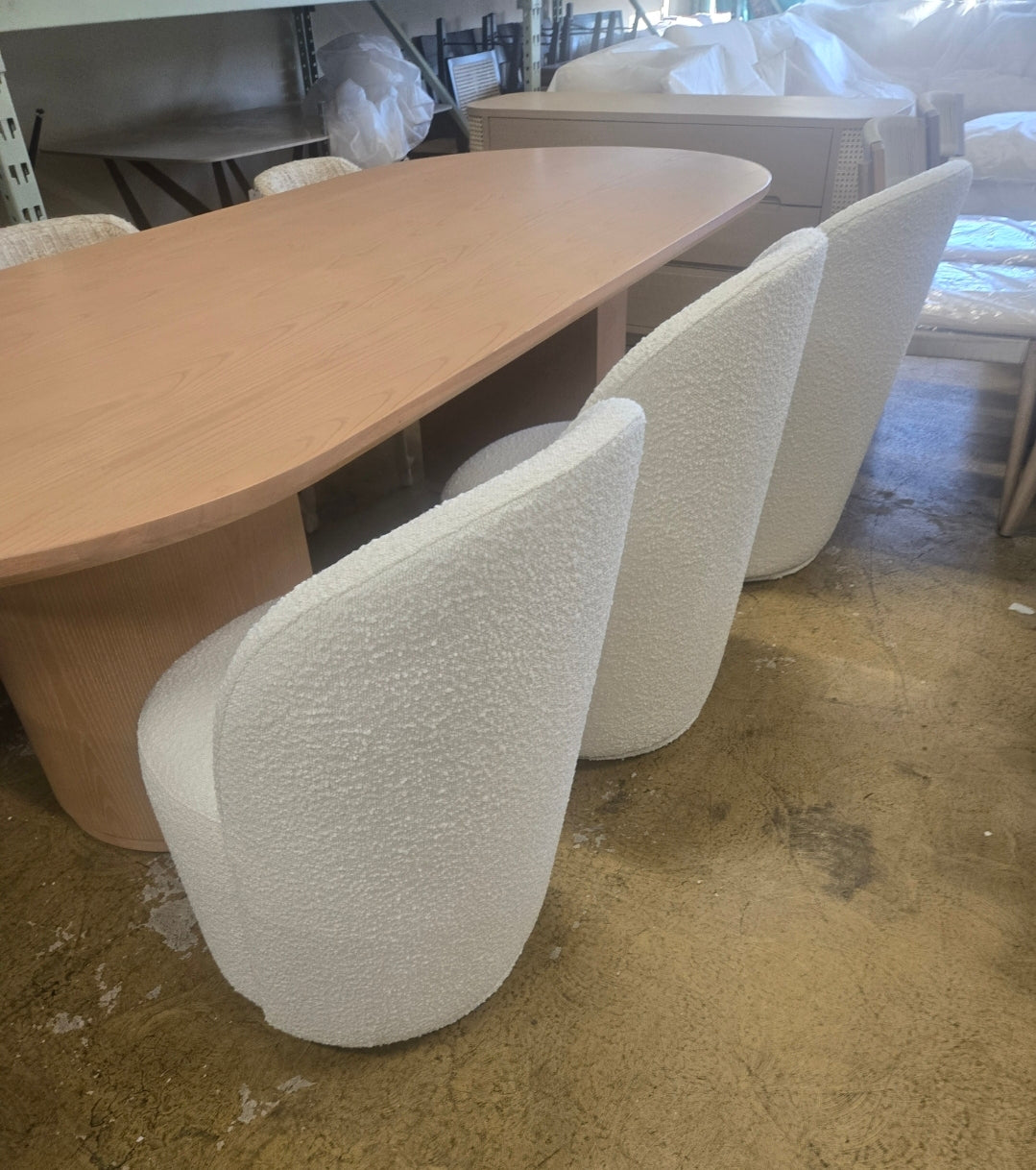 Tete Upholstered Swivel dining chair in ivory performance boucle fabric