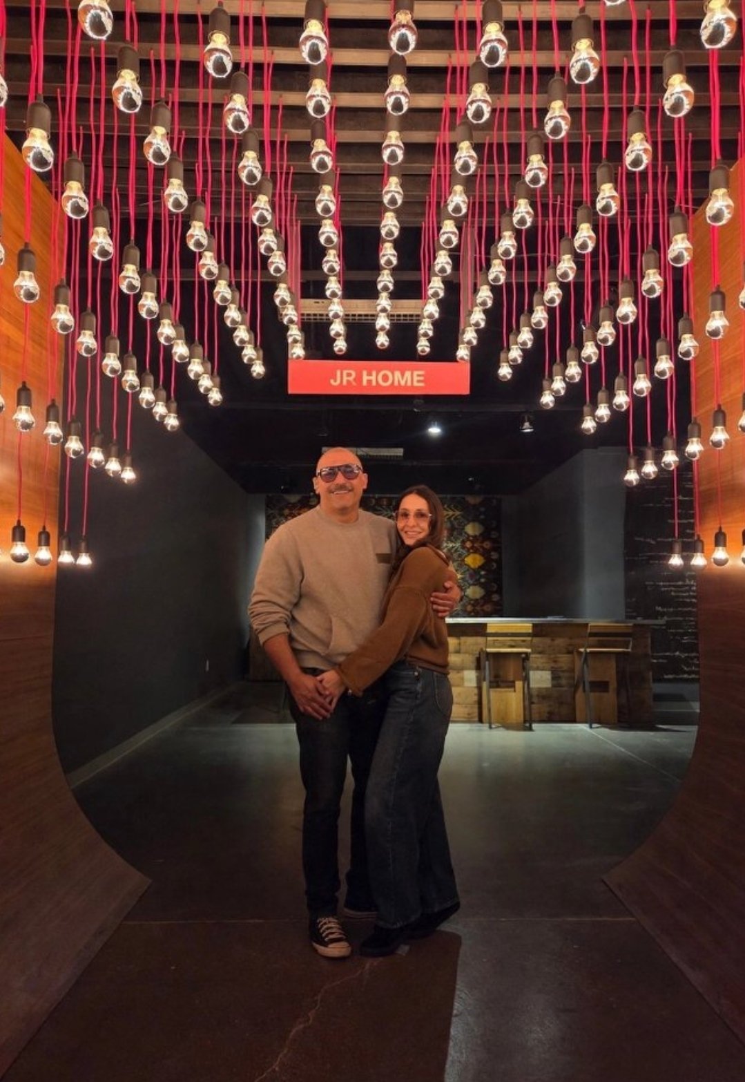 JR and Juda at JR Home Studio under the hanging-bulb installation