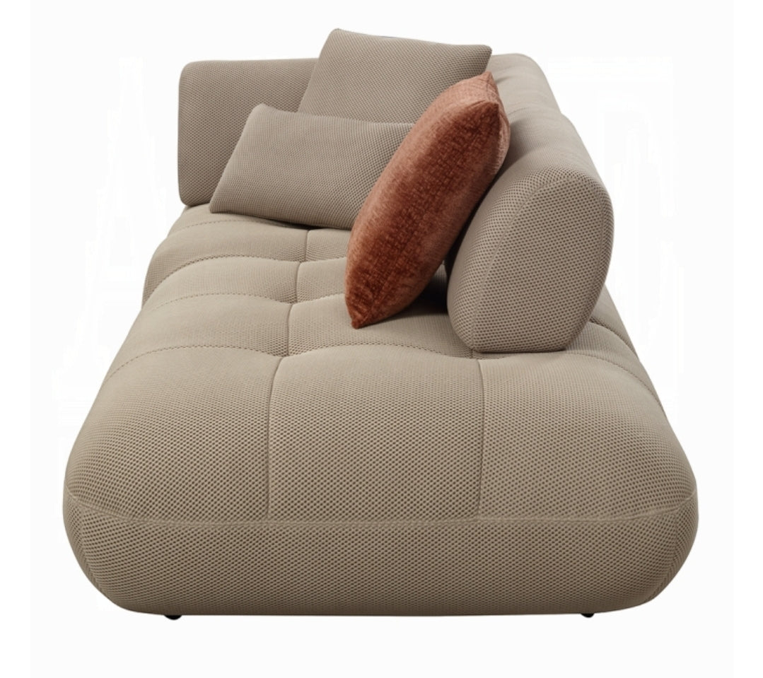 Gorgeous tufted Right facing sectional upholstered in soft beige performance mesh fabric